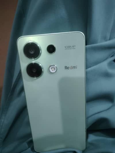 Redmi Note 13.   RAM 8.  Room 256