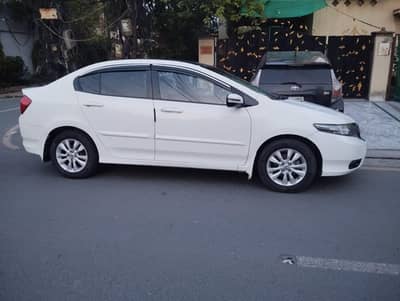 ac on hai 1/2 pic said k touch hain asiper 1.3 hai new car hai try new