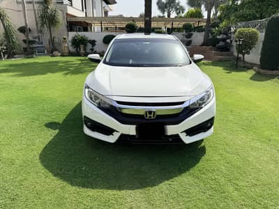 Honda civic 2018 model ug full option red metre total genioun