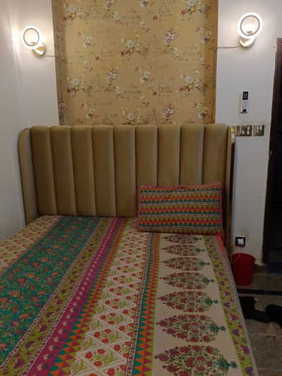 Queen bed with side table