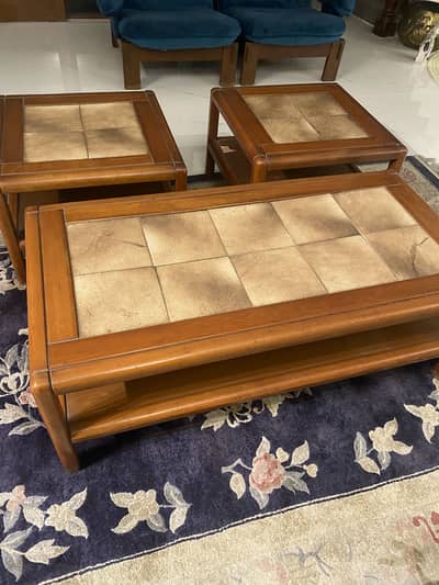 A set of 3 tiled tables…. . 1 center and two side tables