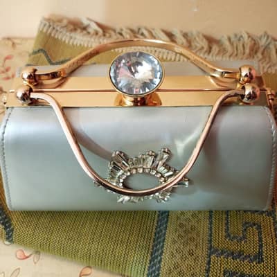 Elegant silver clutch with Stone work