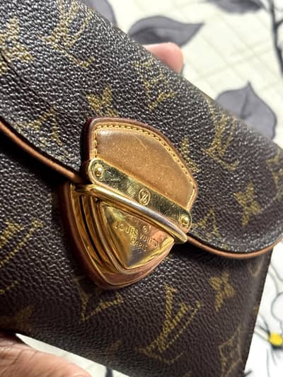 Louis Vuitton Monogram Eugenie Wallet (Model: M60123).