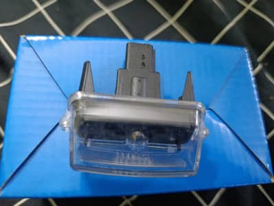 Toyota corolla GLI number plate light