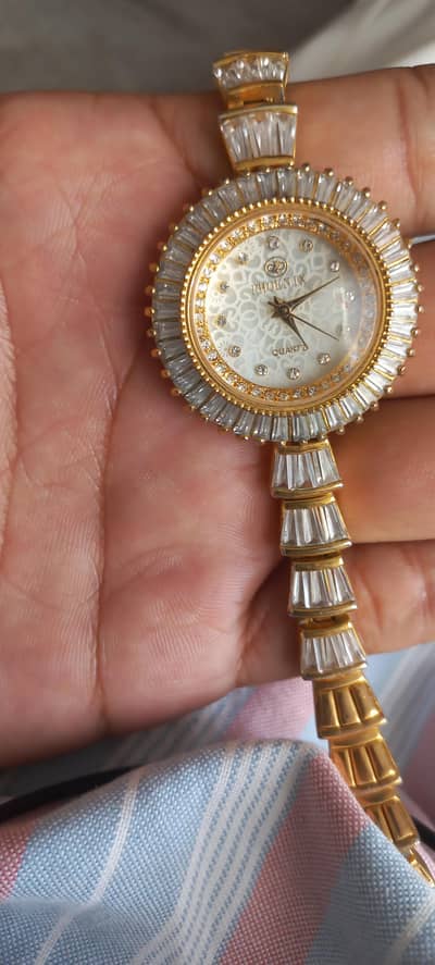 STAINLESS STEEL BACK 22K GOLD PLATED