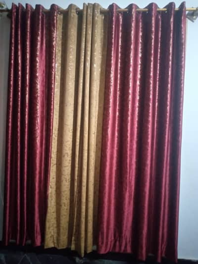 Used dual tone Maroon and golden eyelet curtains set (4 pieces)