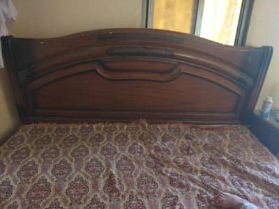full size bed and side table