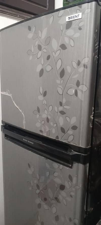 orient refrigerator kind size in new condition,company condition