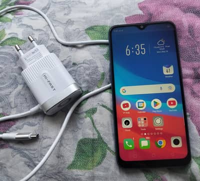 Oppo A5s with charger and straightner