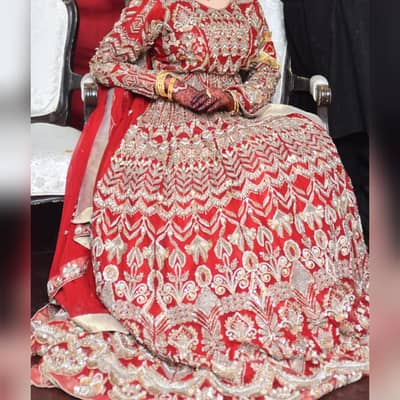 bridal lehnga  with heavy embroidery . dupatta and bag also