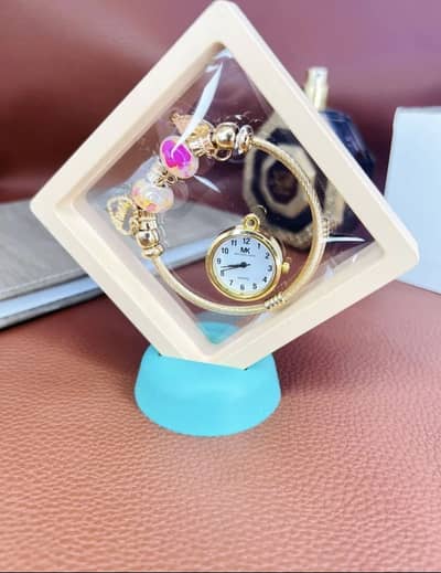 Gold brass watch with owl charm