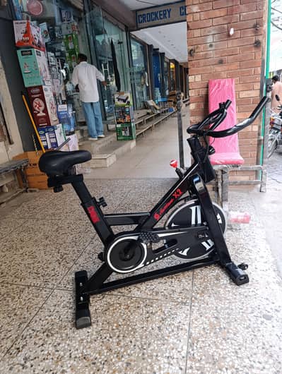 spinning exercise bike with adjustable resistance used in good conditi
