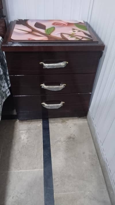 Two single bed set and one side table