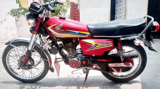 honda 125 Sargodha number All ok good condition golden number 9797