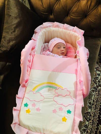new baby carry cot (pink), used only once for photo