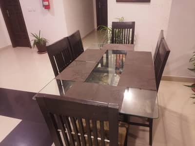 2 Dining table with glass top for sale