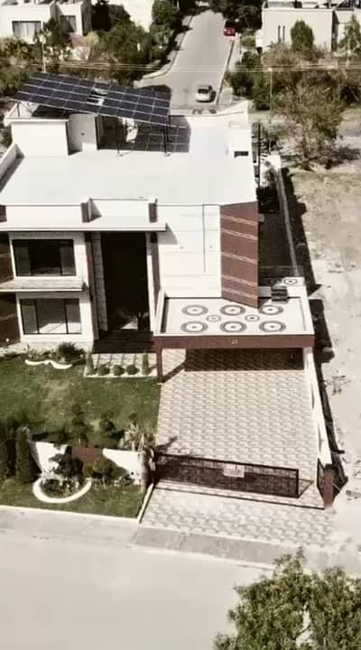 2 KANAL 12 MARLA NEW DESIGNER HOUSE WITH SWIMING POOL AND MOVIE CINEMA