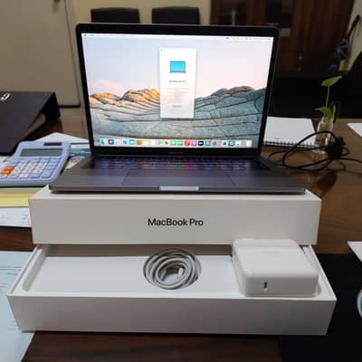 MacBook Pro 2019 Touch Bar | Never Opened | 69 Battery Cycles genuine