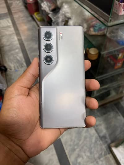 Techno camon 40 pro,(8/256) still in warranty, location haripur.