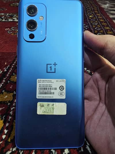 one plus 9 5g 10/10 still import seal is on its back
