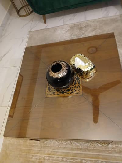 wooden coffee table with glass top for sell in excellent condition