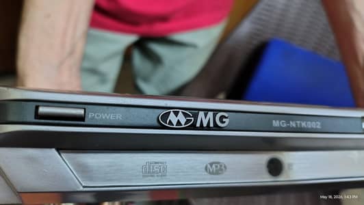 MG DOLBY DIGITAL DVD/MP3 PLAYER | MODEL MG-NTK002 |