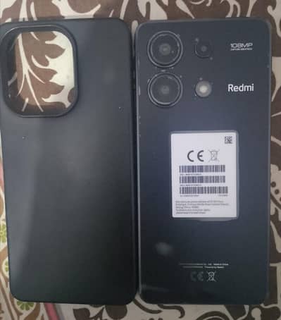 Xiaomi Redmi Note 13 8+256 in finger display 120Hts Snapdragon gaming