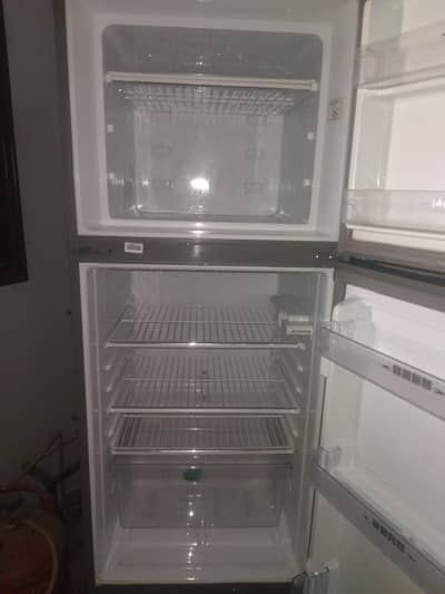 fridge in new condition .