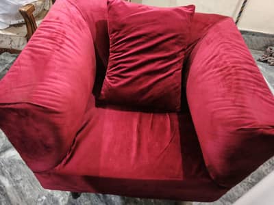 1 seater red sofa , with cushion for sale