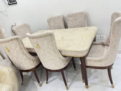 Dining table with PVC top