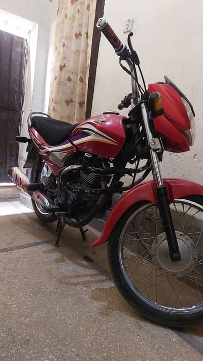 Honda CG 125 2014 A.       WhatsApp no 03339981436
