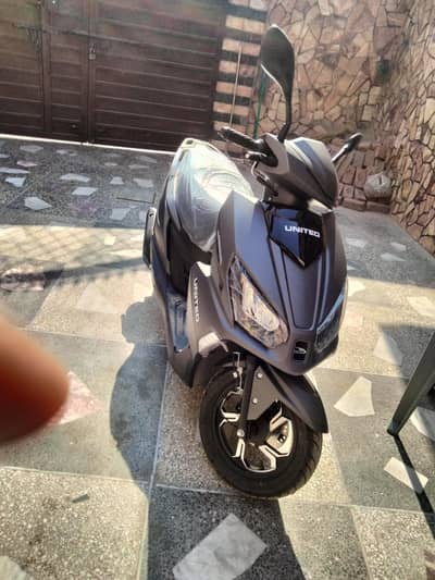 united Scooty 100cc zero meter