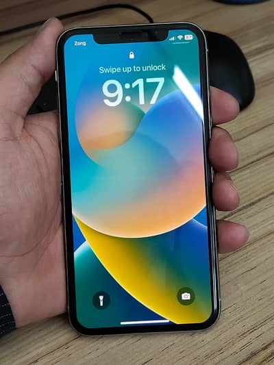 Iphone x  Exchange possible waterpack  64 gb All ok pta Approved