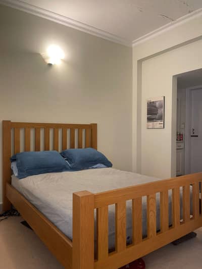 Oak standard double bed UK size.