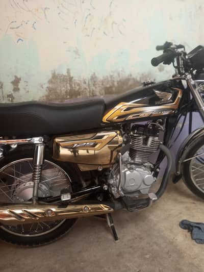 Honda 125 self start gold edition