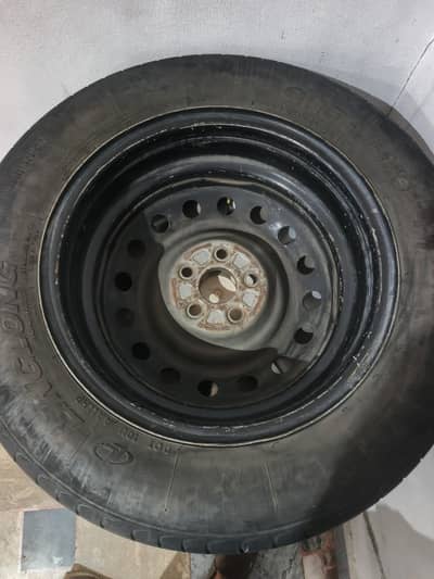 Corolla 2009 onward 2025 tek ke steel rims aur tyre company fitted