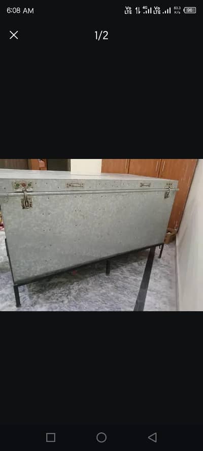 large iron peti trunk
