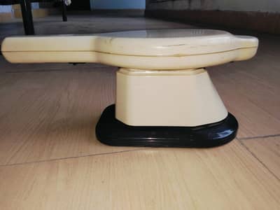Thrive 717 Series handheld body massager.