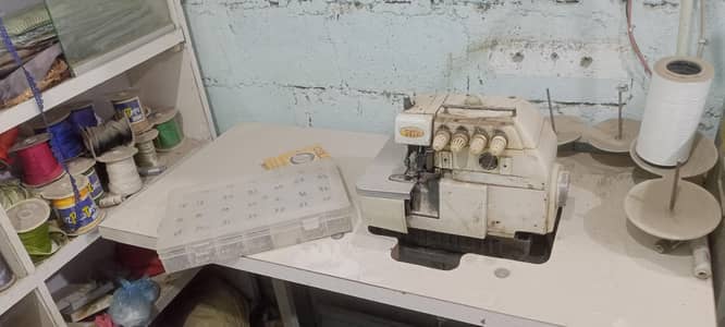 Overlock Machine, Button Press, Lace & Nalki Material setup for sale