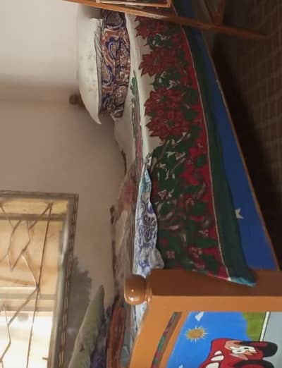 Kids wooden bed in good condition with mattress