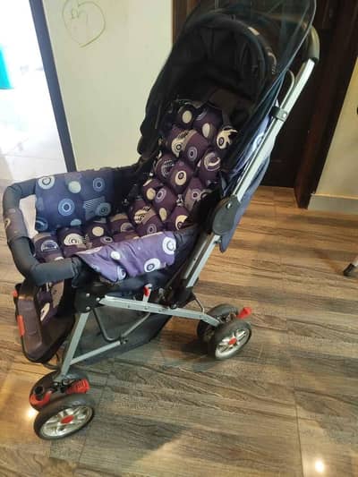 compact lightweight baby stroller with adjustable canopy. blue pattern
