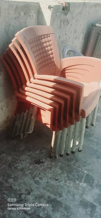 6plastic chairs with foldable table