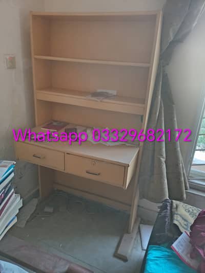 2 study tables along with chairs