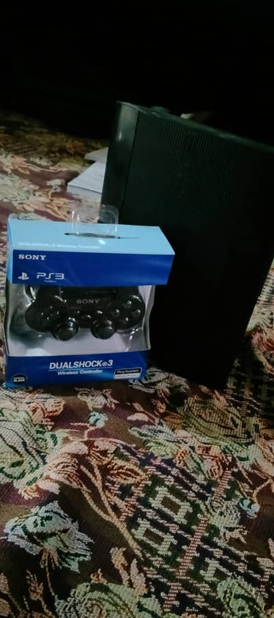 ps3 super slim( jailbreak) 500gb (wireless controller) 10/10 condition