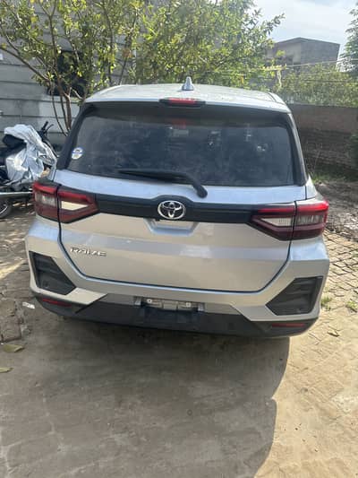 Silver colour car model raize for sale