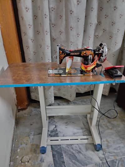 almost new rocket salai machin with table smooth running home use