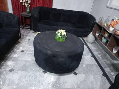 Elegant black sofa set with table