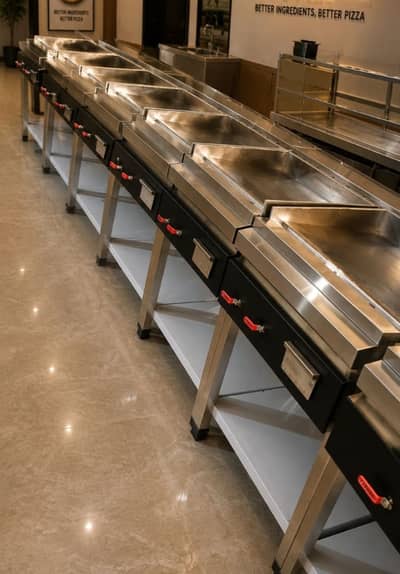 pizza oven ark// dough machine// prep table// deep fryer// hot plate
