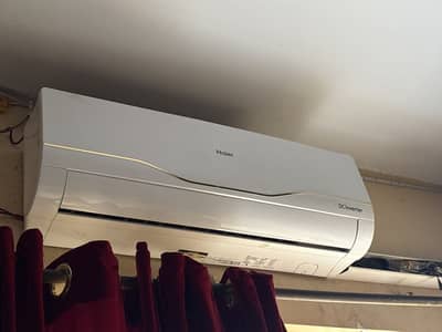 Alert 1 ton haier dc inverter