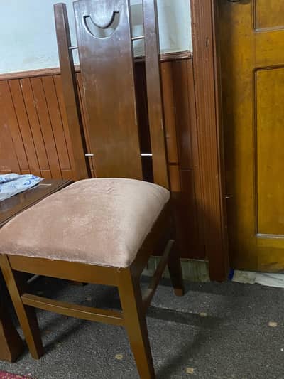 2 chairs with table